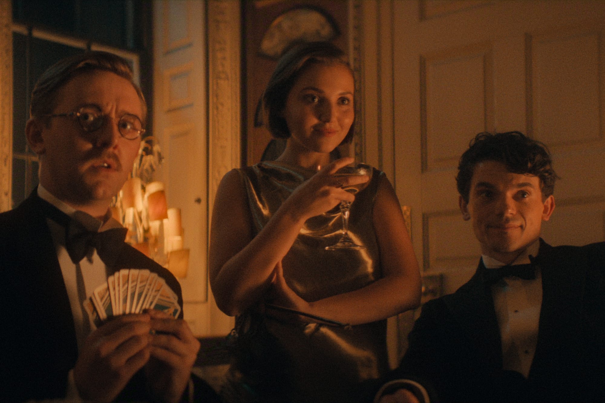 Josef Davies as Alfred, Mia McKenna-Bruce as Bundle, and Edward Bluemel as Jimmy in 'Agatha Christie's Seven Dials'