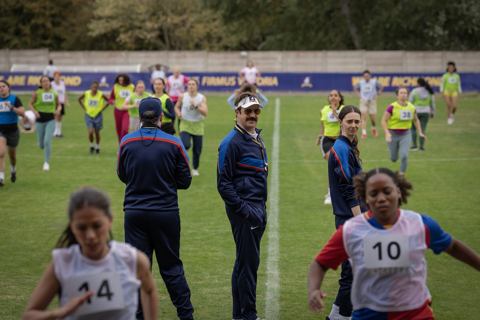 Brendan Hunt, Jason Sudeikis and Tanya Reynolds in "Ted Lasso" Season 4