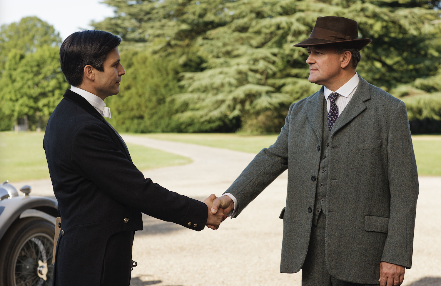 Lord Grantham (Hugh Bonneville) says farewell to Thomas (Robert James-Collier).