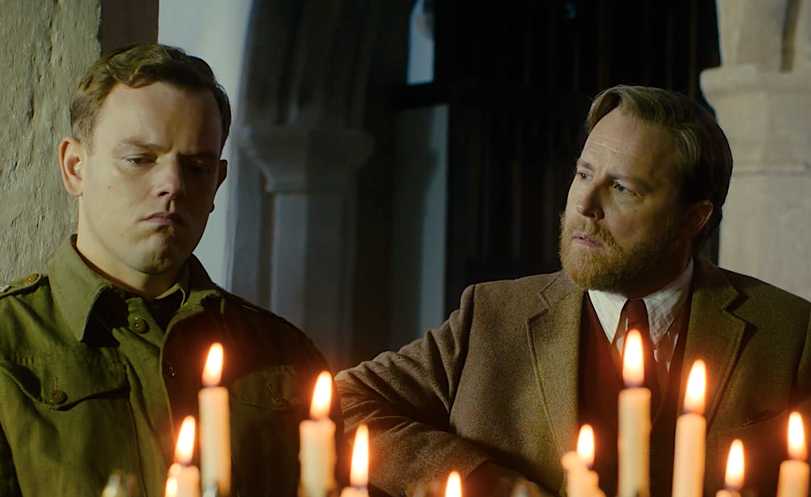 Tristan Farnon (CBy candlelight in the church, Tristan (Callum Woodhouse) shares his traumatic war experience with brother Siegfried (Samuel West).