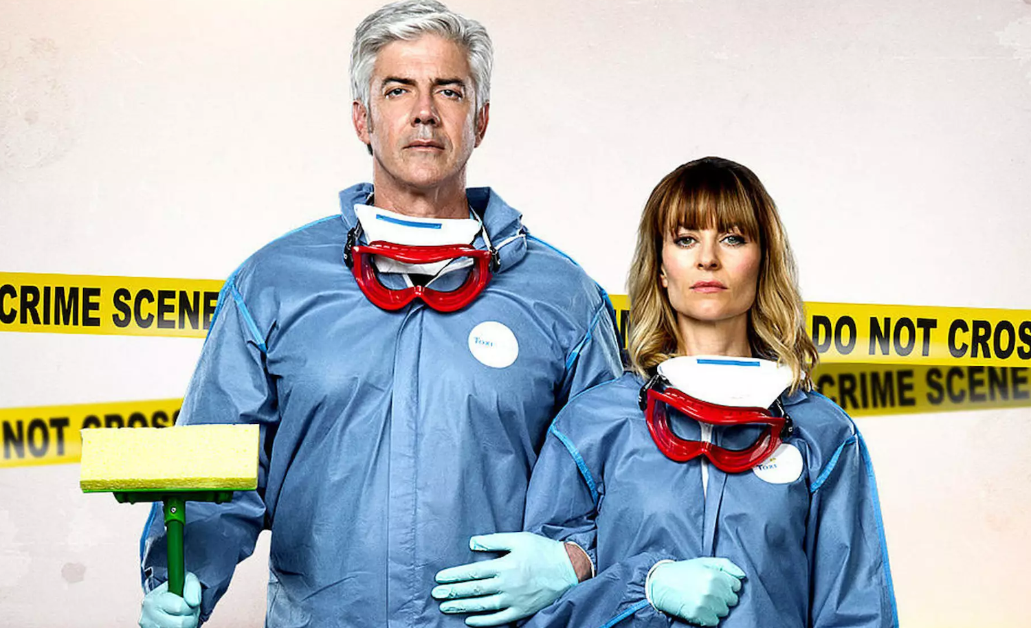Charlie Buchanan (Shaun Micallef) and Nicola Buchanan (Kat Stewart) dressed in cleaning gear
