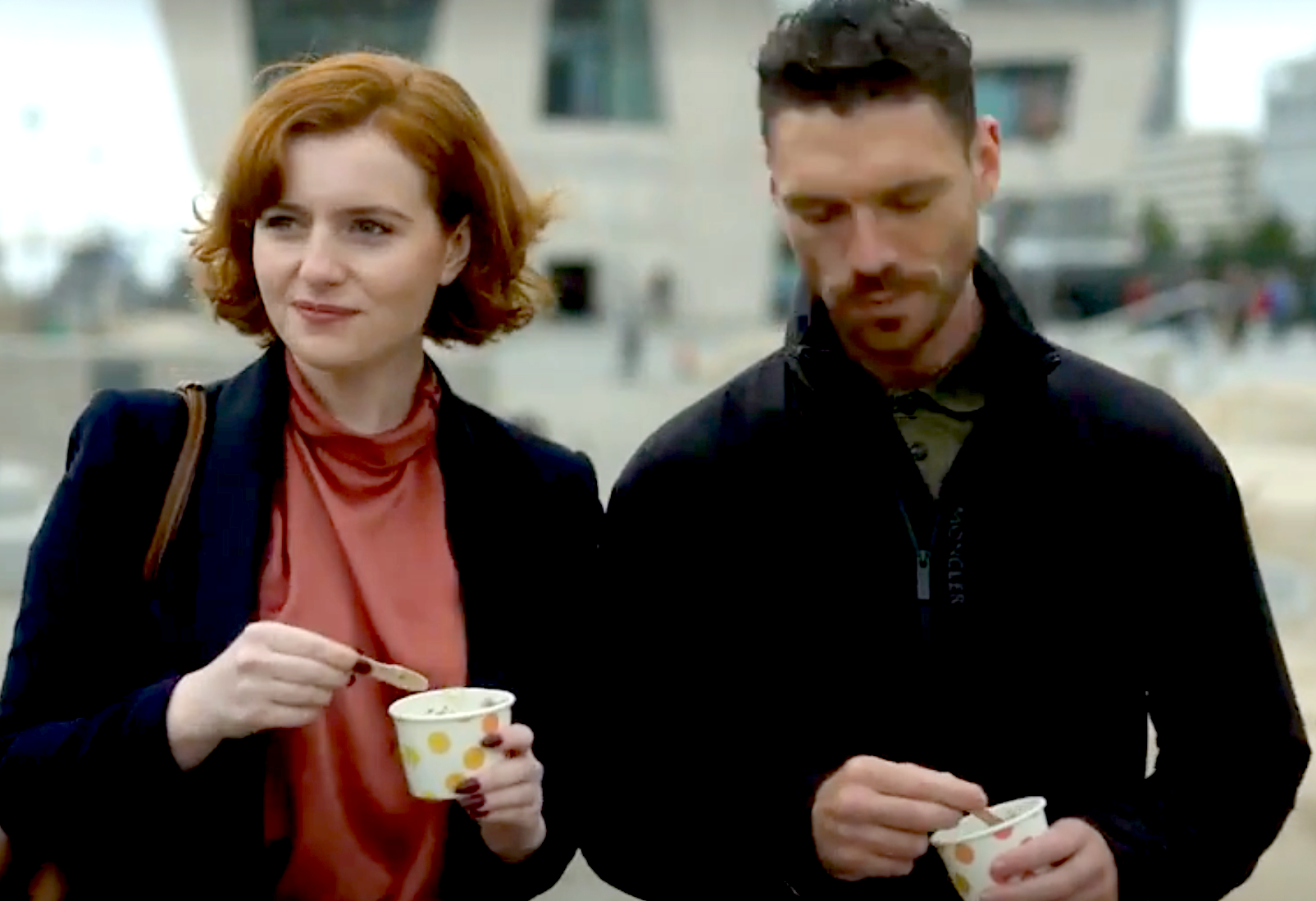 Michael (James Nelson-Joyce) and Diana (Hannah Onslow) eat ice cream in the tourist area of Liverpool.