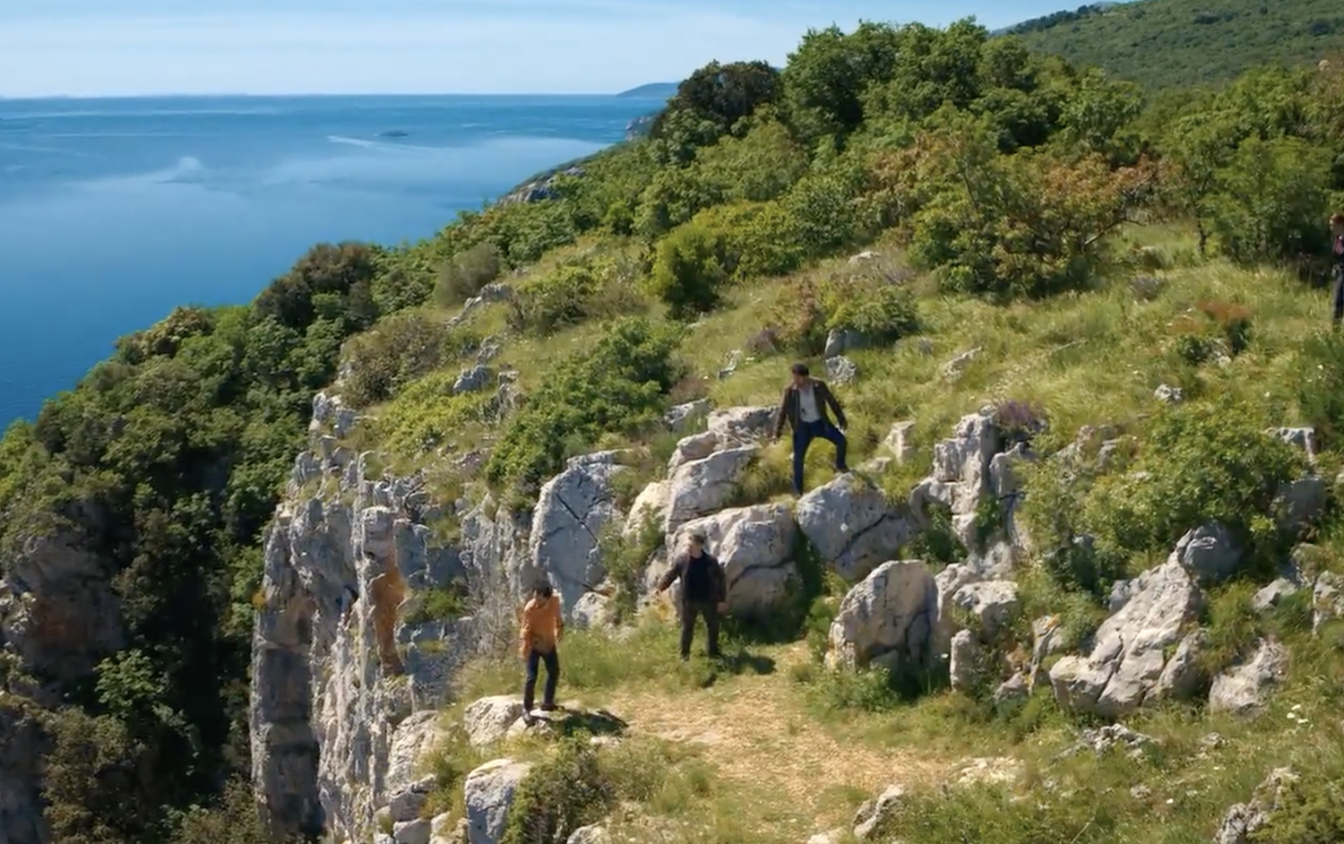 Joe (Warren Brown), center,&nbsp;reaches out to Manny (Hari MacKinnon) on the cliff edge while Gianni Gallo (Marouane Zotti) stands above