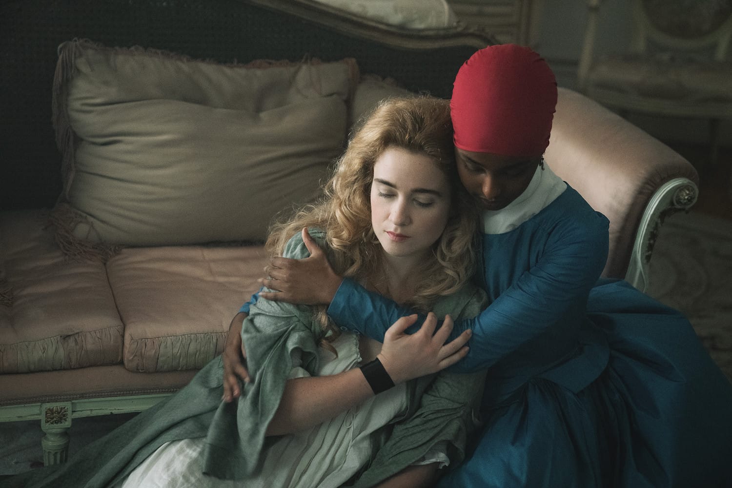 Friends by necessity, Victoire (Kosar Ali) and Camille (Alice Englert) seek comfort together.