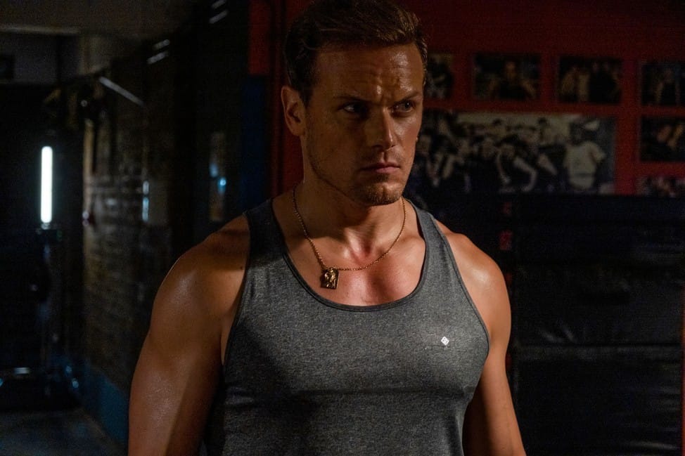 Bad cop, good pecs.&nbsp;Sam Heughan as Ryan, Danny's partner.