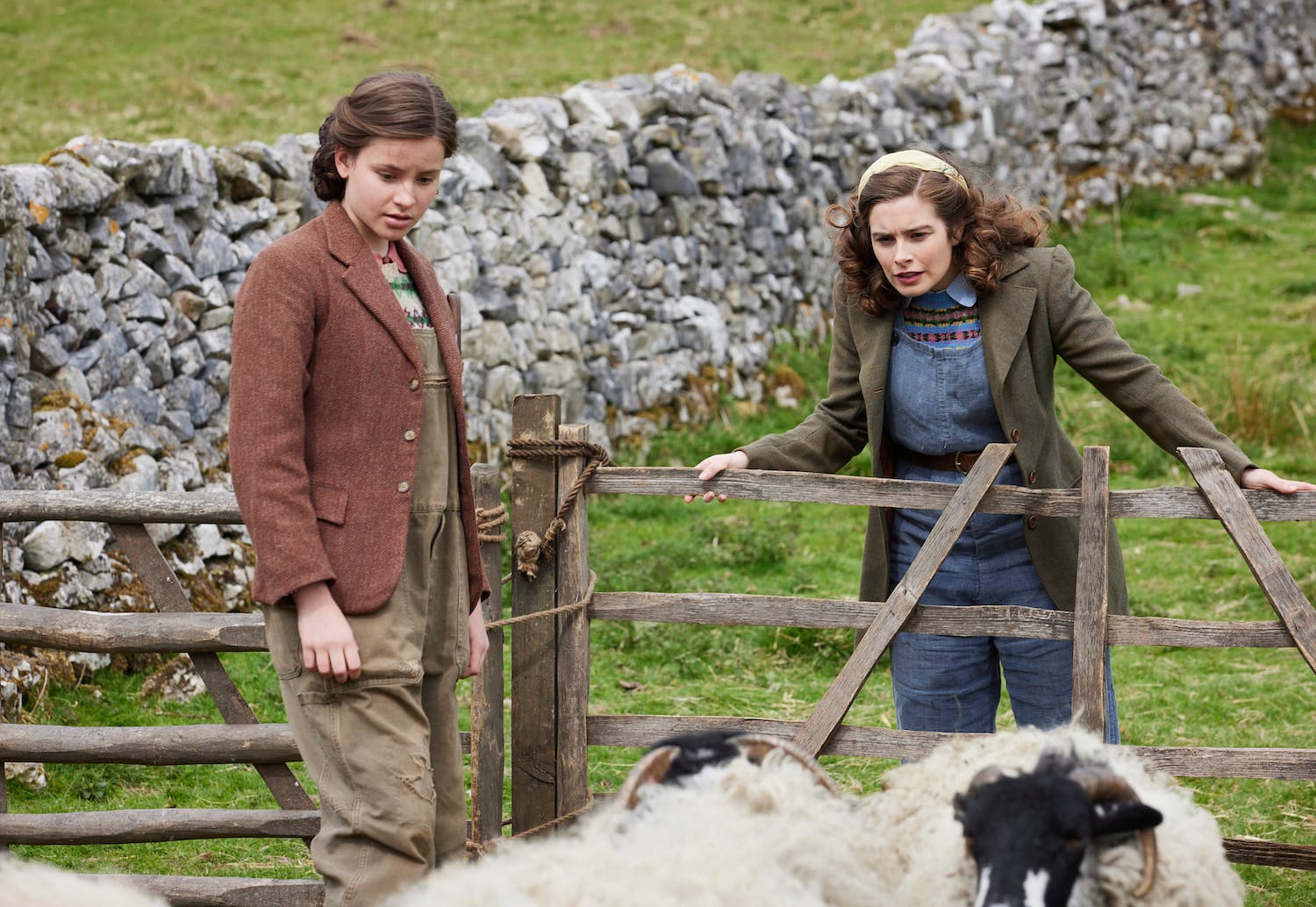 Helen (Rachel Shenton) and younger sister Jenny (Imogen Clawsen) at work on the farm.