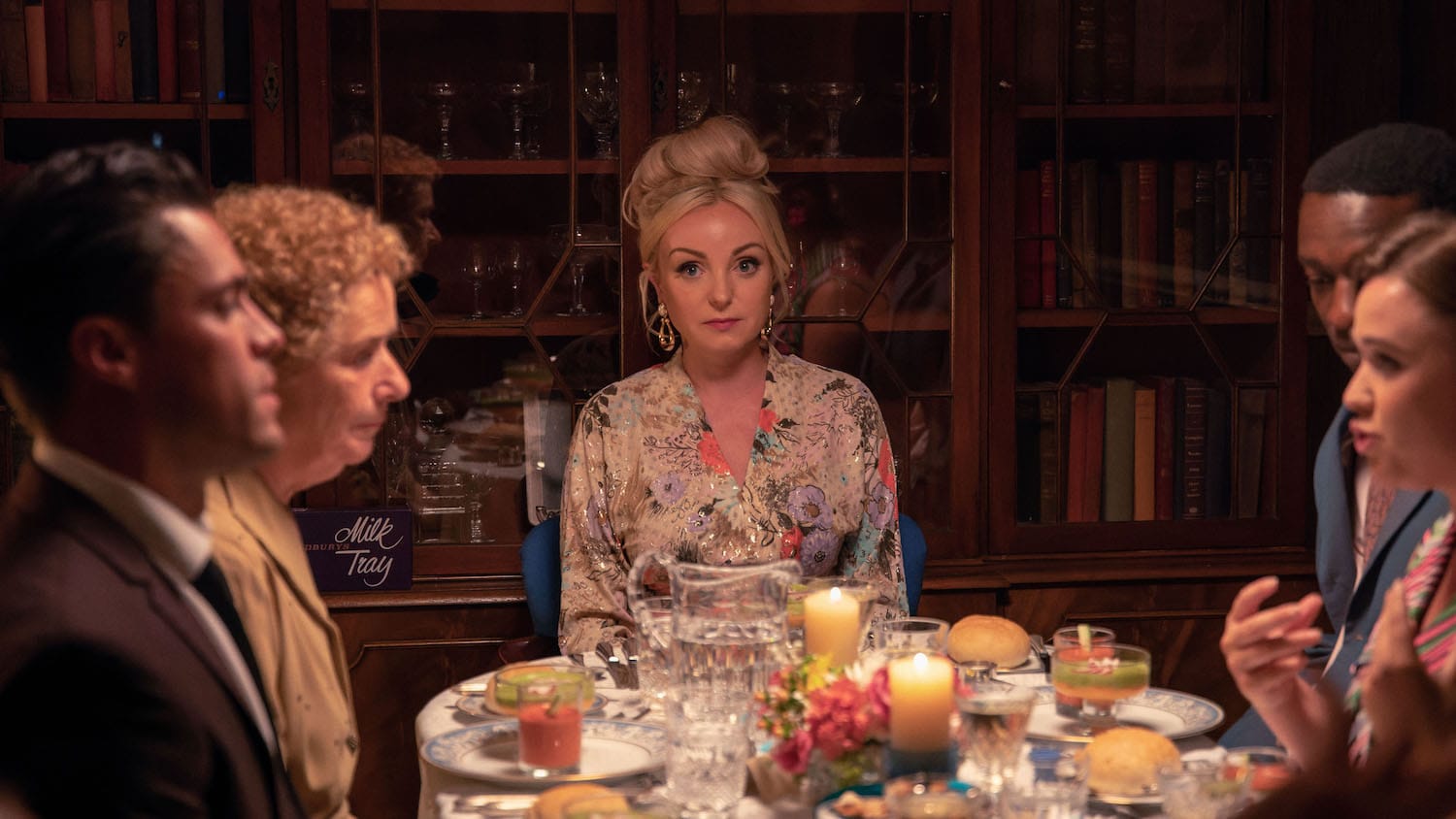 Hostess Trixie (Helen George) at the head of the table, waits nervously for her guests to taste the food. Left to right, fiancé Matthew Aylward (Olly Rix), Nurse Phyllis (Linda Bassett), Cyril Robinson (Zephryn Tate) and Nurse Nancy (Megan Cusack).