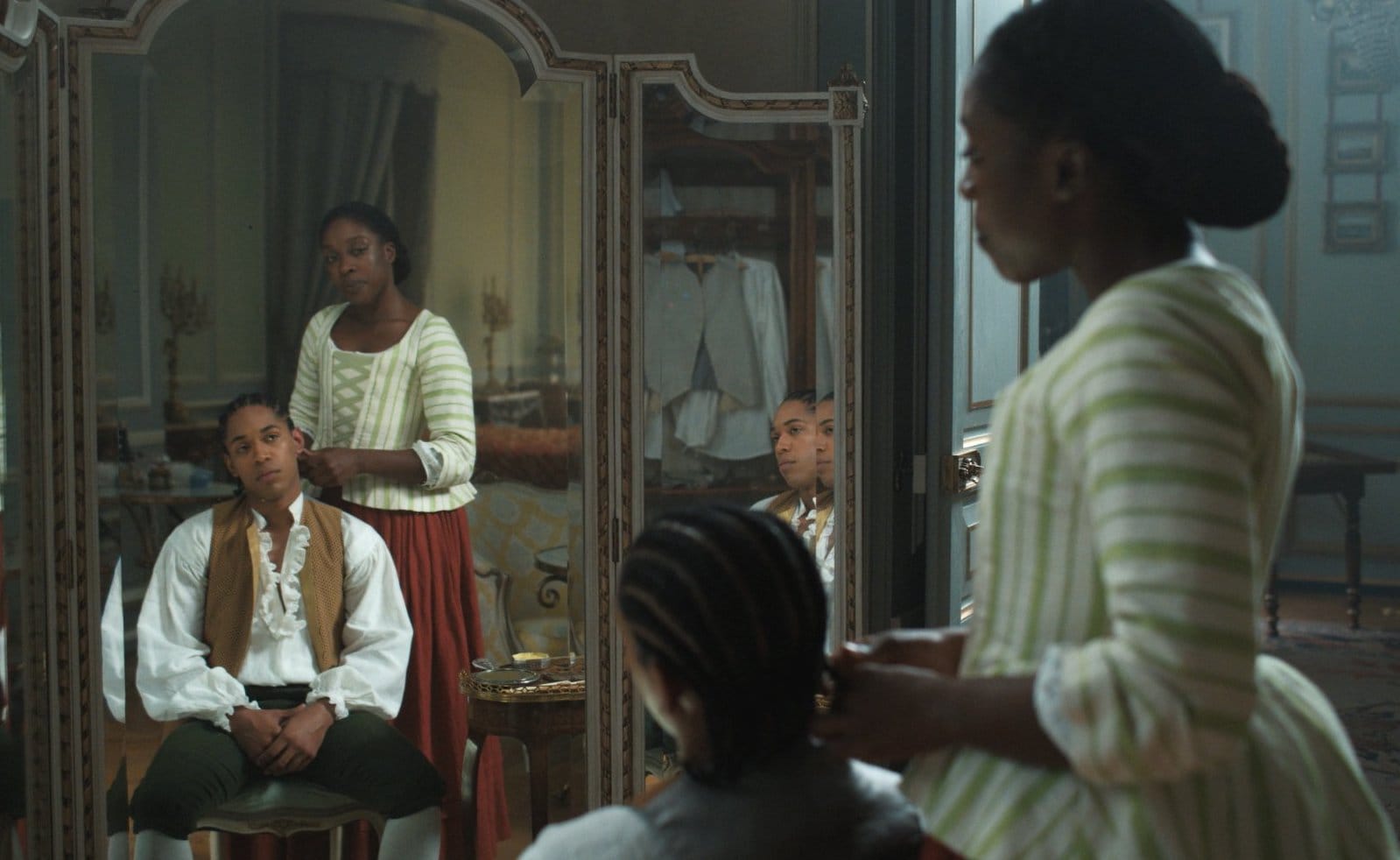 Joseph (Kelvin Harrison Jr.) and his mother Nanon (Ronke Adékoluẹjo).