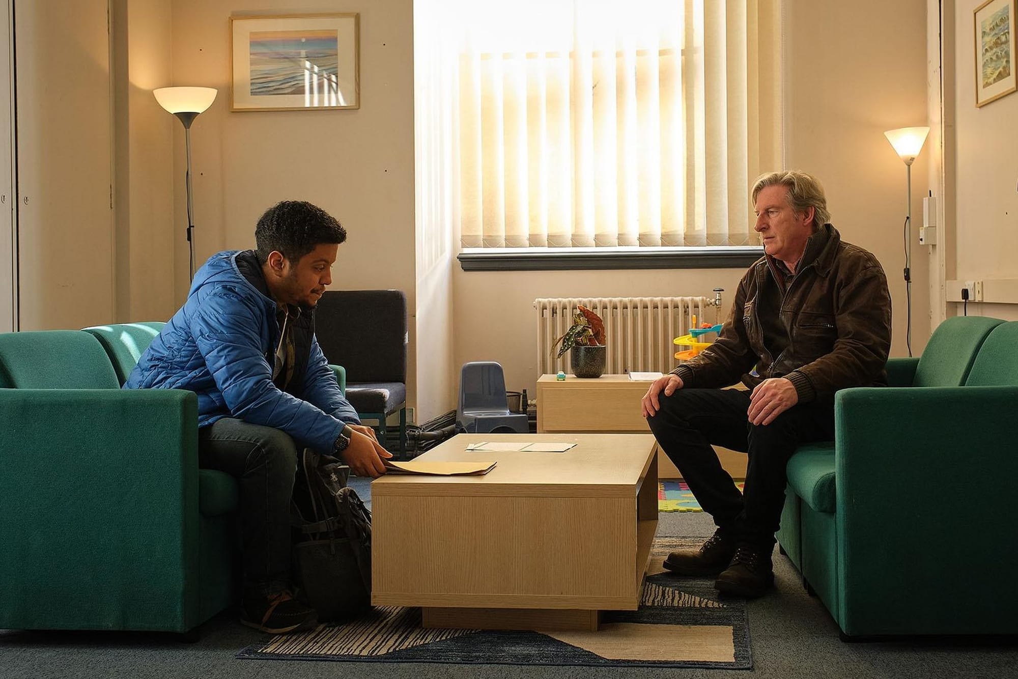 Zak Douglas as Kit McKellen and Adrian Dunbar as Alex Ridley in Ridley Season 1