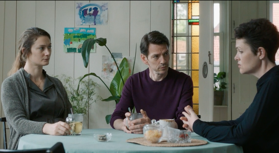 Lauren Teuling, the former Jasmijn Brahm (Daisy Badger), her husband Vincent (Alwin Pulinckx), and her handler Hanna Zuiderduin (Lu Corfield).