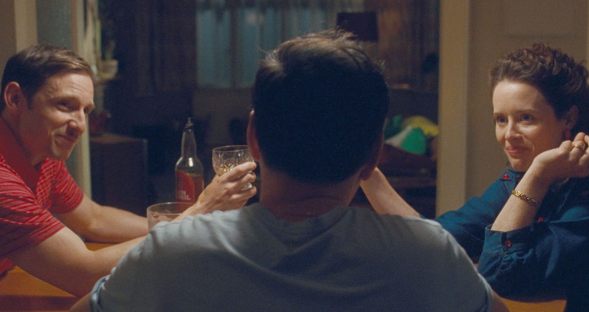 Jamie Bell as Dad, Andrew Scott as Adam, Claire Foy as Mum in 'All of Us Strangers'