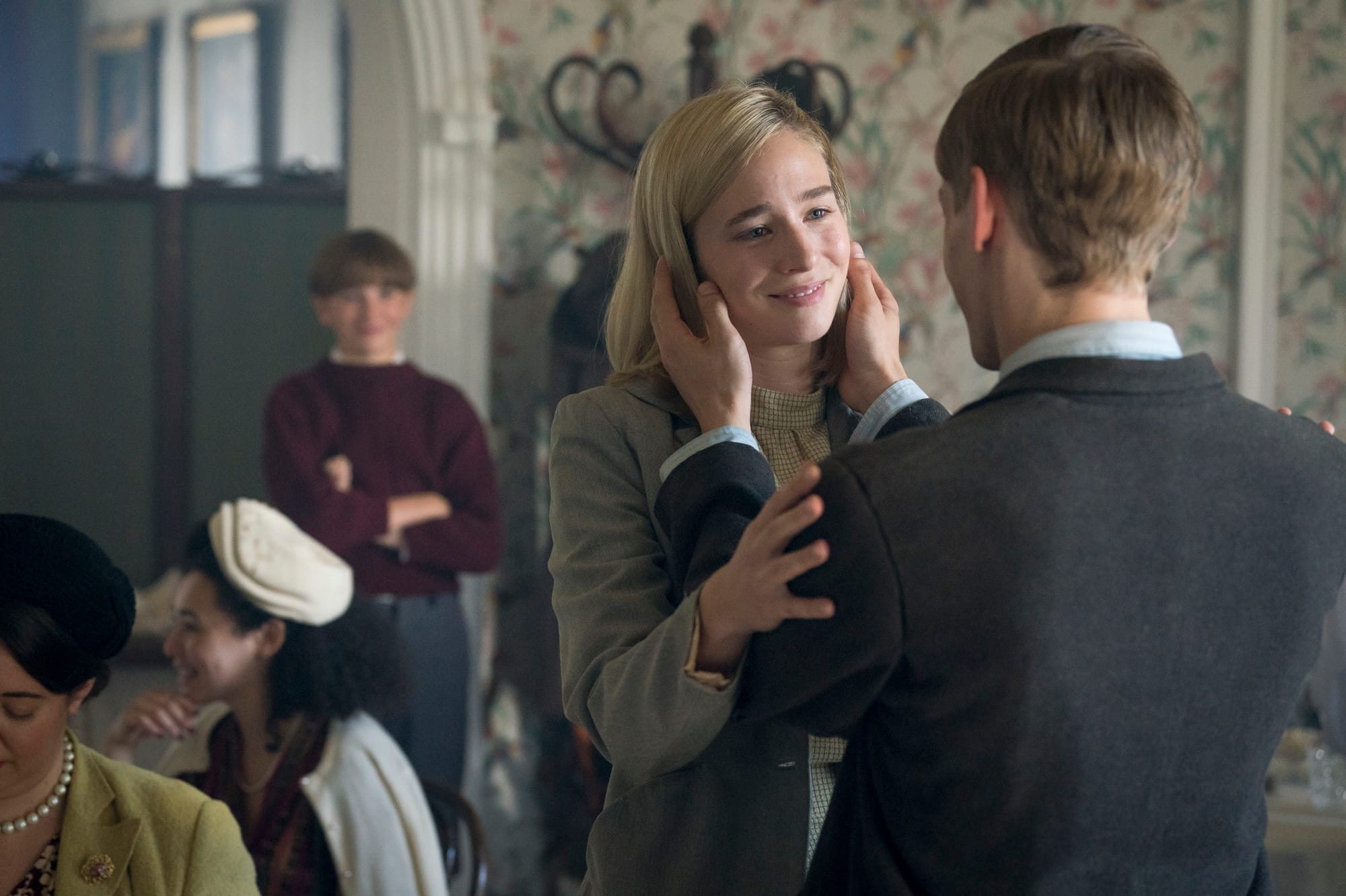 Jan (Eryk Biedunkiewicz) looks on as Kasia (Zofia Wichłacz) and her brother Grzegorz (Mateusz Więcławek) are reunited.