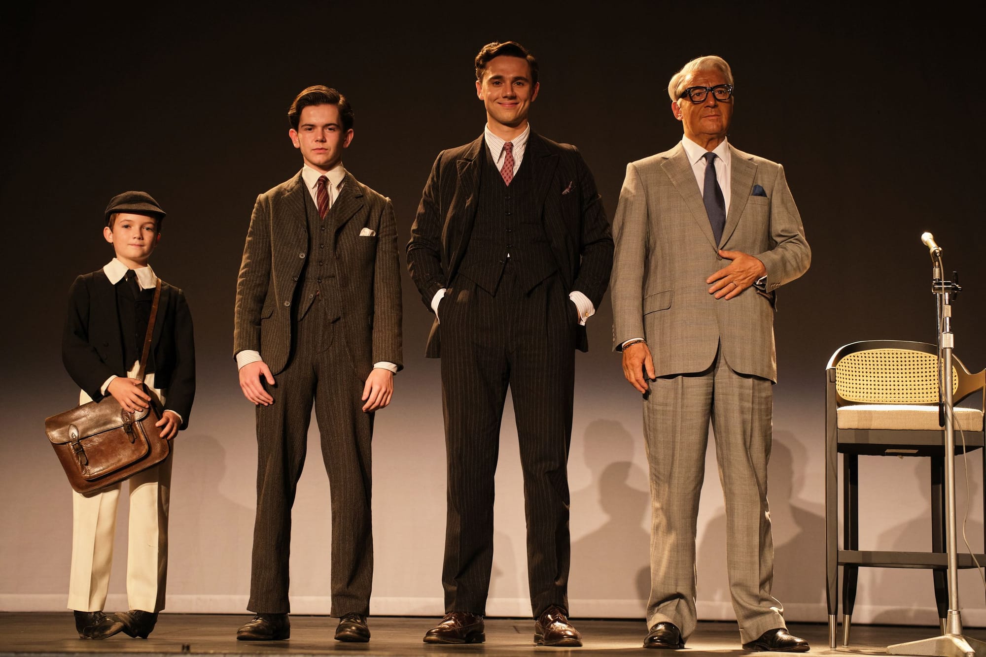 The four actors who play Archie Leach aka Cary Grant over the years of his life in 'Archie': Dainton Anderson as young Archie, Oaklee Pendergast as Teen Archie, Calam Lynch as 20-something Archie, and Jason Isaacs as Cary Grant in his later years.