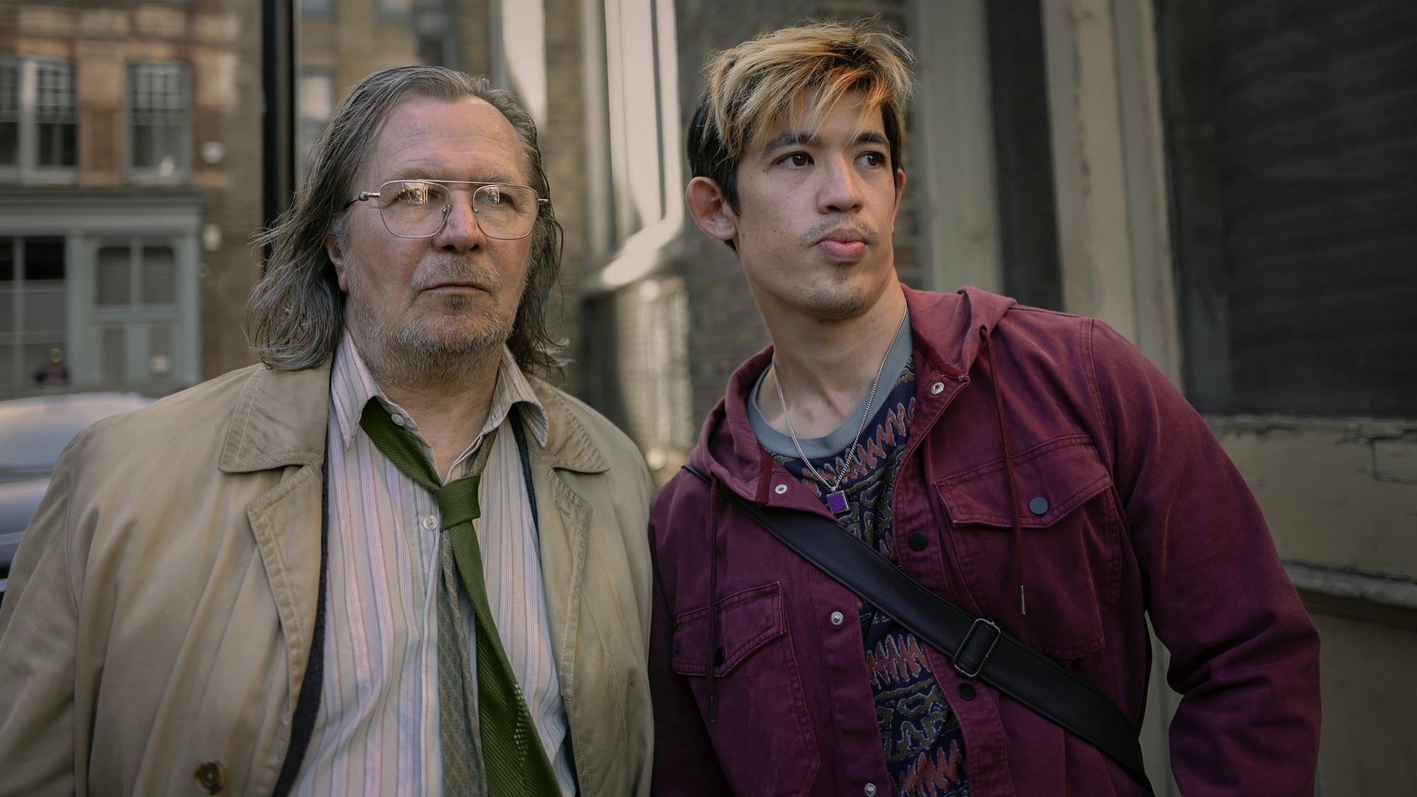 Gary Oldman as Jackson Lamb and Christopher Chung as Roddy Ho in Slow Horses Season 3