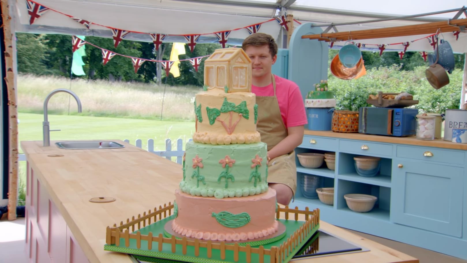 Josh with his A Slice For All Seasons Showstopper Cake from 'The Great British Baking Show' Season 14's Grand Final&nbsp;