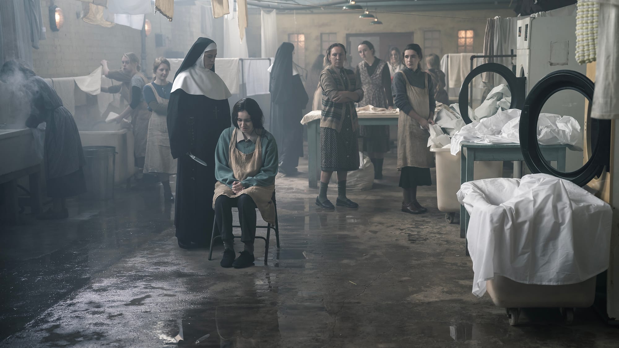 Aoibhinn McGinnity as young Sister Eileen and Ciara Stell as young Clemence in The Woman in the Wall Season 1