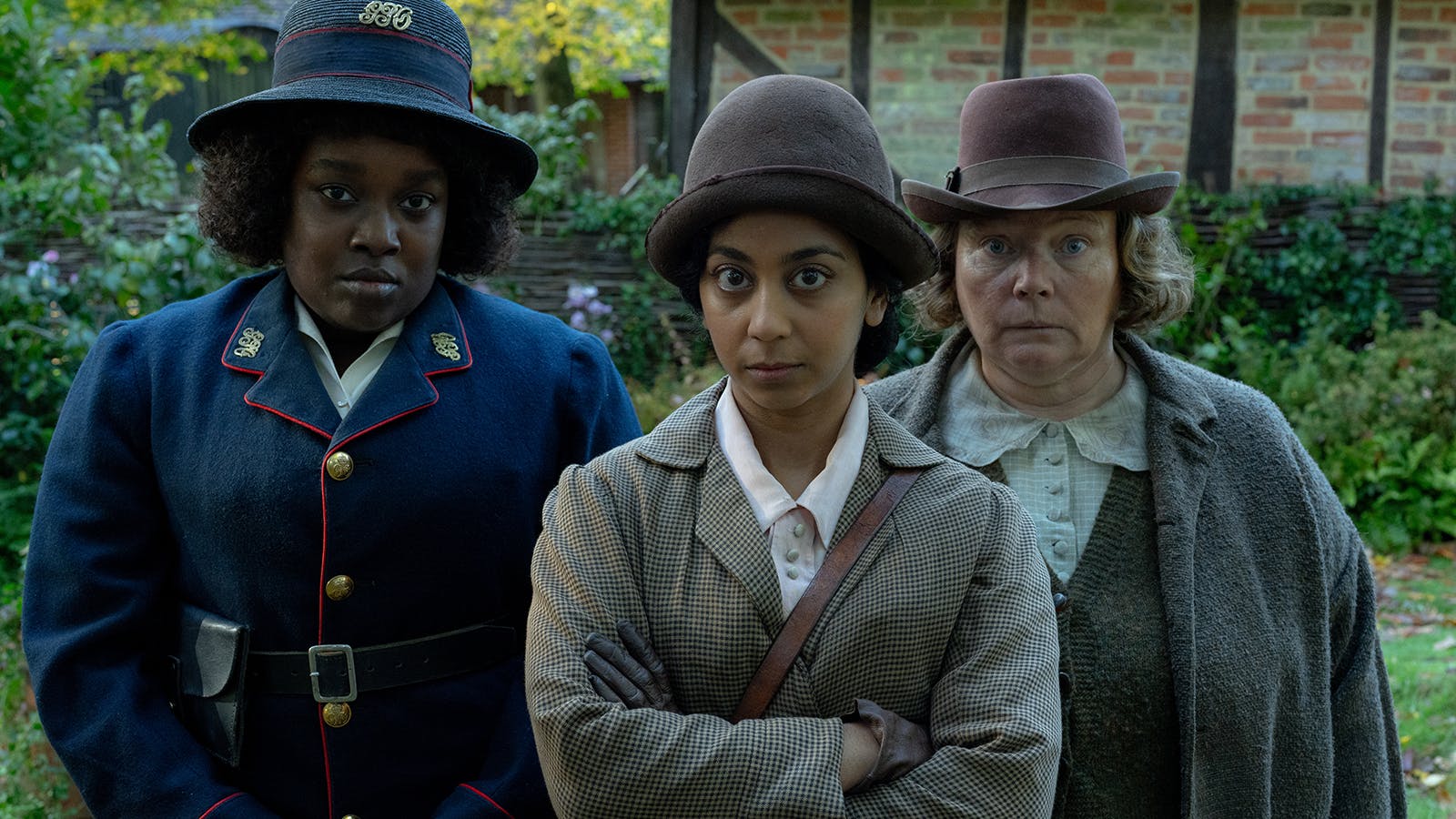 Lolly Adefope as sub-postmistress Kate, Anjana Vasan as PC Gladys Moss, and Joanna Scanlan as livestock farming amateur detective Ann in 'Wicked Little Letters'
