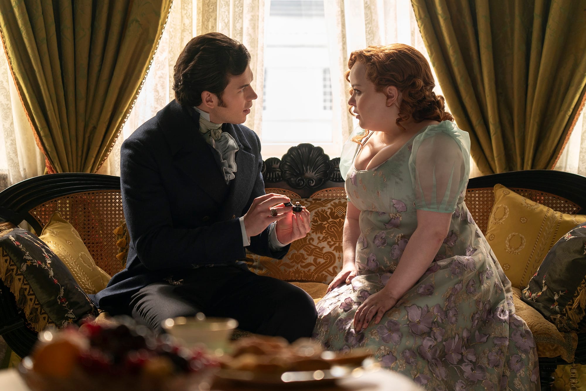 Luke Newton as Colin Bridgerton and Nicola Coughlan as Penelope Featherington in 'Bridgerton' Season 3