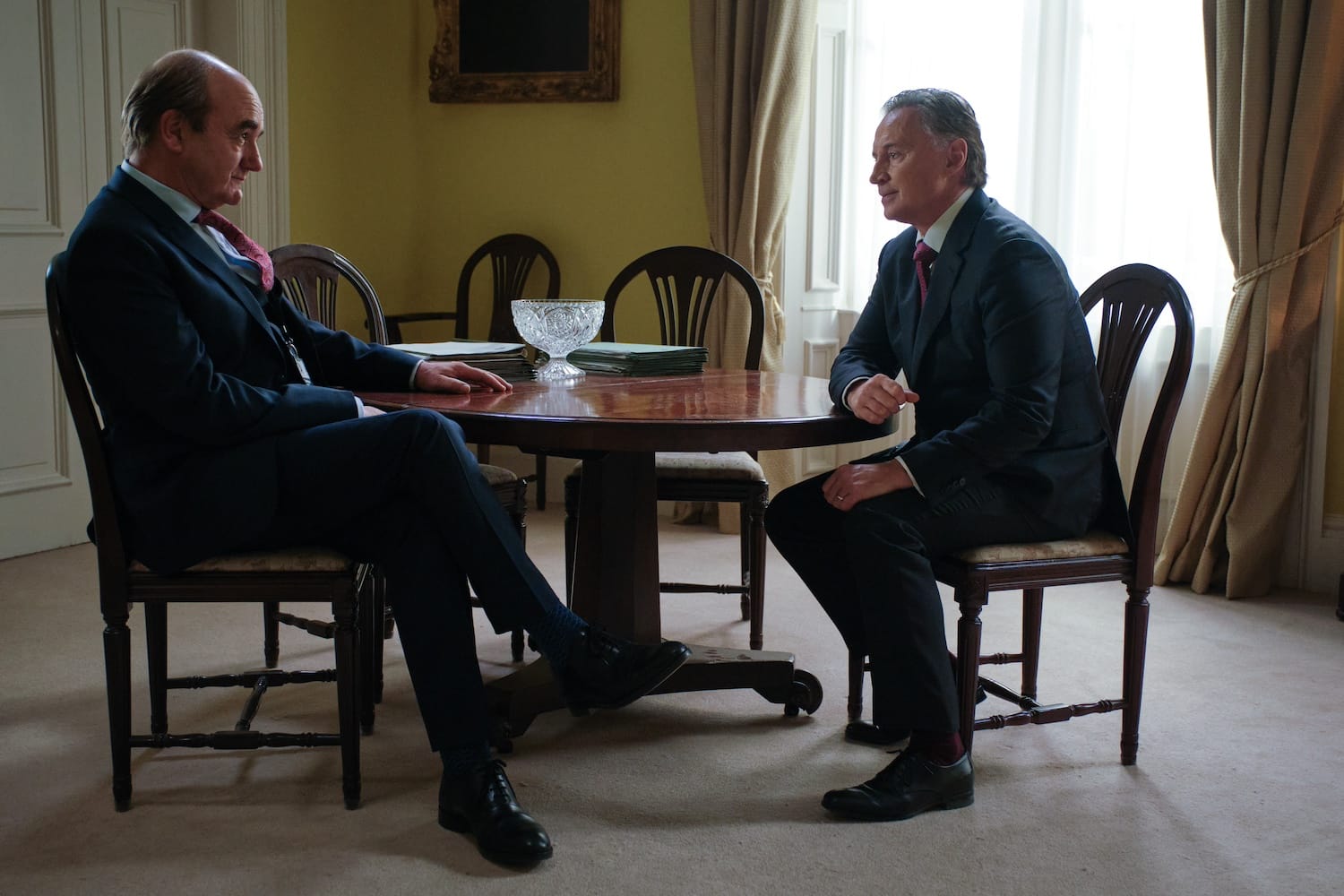Archie Glover-Morgan (David Haig) and PM Robert Sutherland (Robert Carlyle)