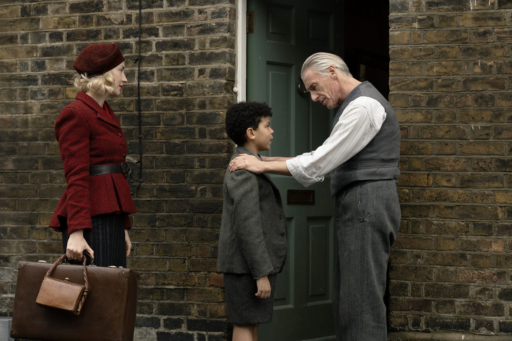 Saoirse Ronan as Rita, Elliott Heffernan as George and Paul Weller as Gerald in 'Blitz'