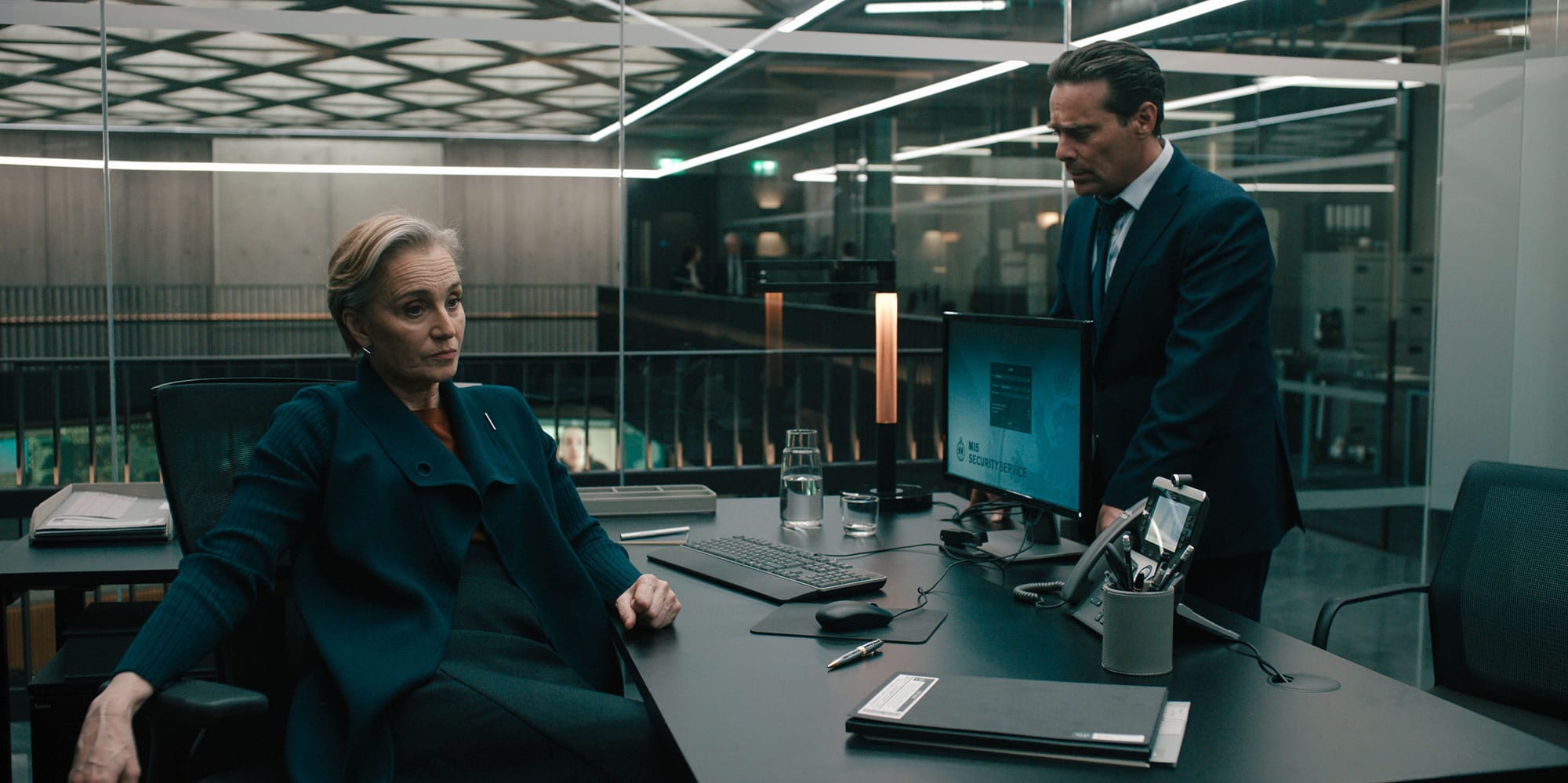 Kristin Scott-Thomas as Diana Taverner and James Callis as Claude Whelan in 'Slow Horses' Season 4