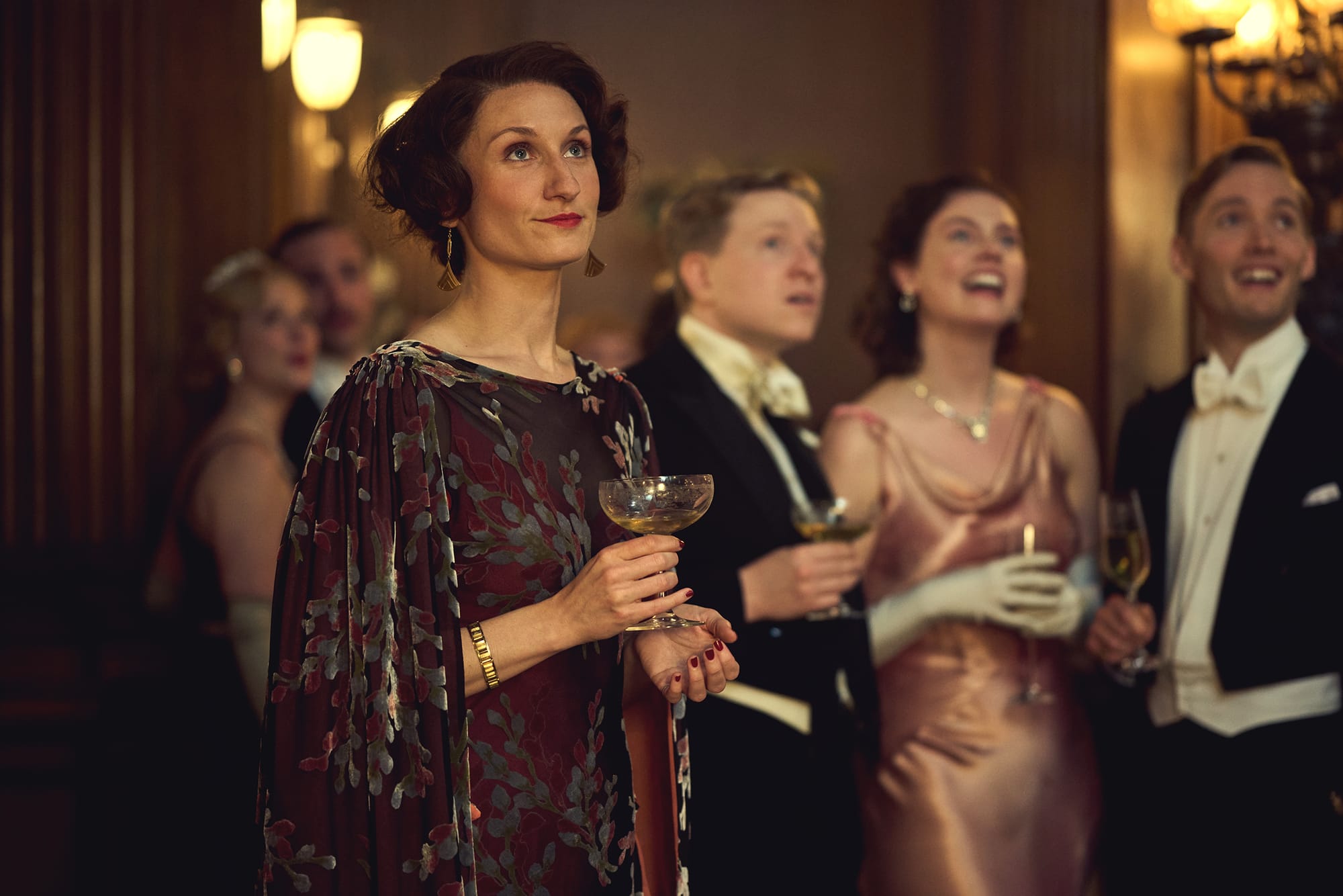 Bessie Carter as Nancy Mitford, Will Attenborough as Joss, Isobel Jesper Jones as Pam Mitford, Toby Regbo as Tom Mitford in 'Outrageous'
