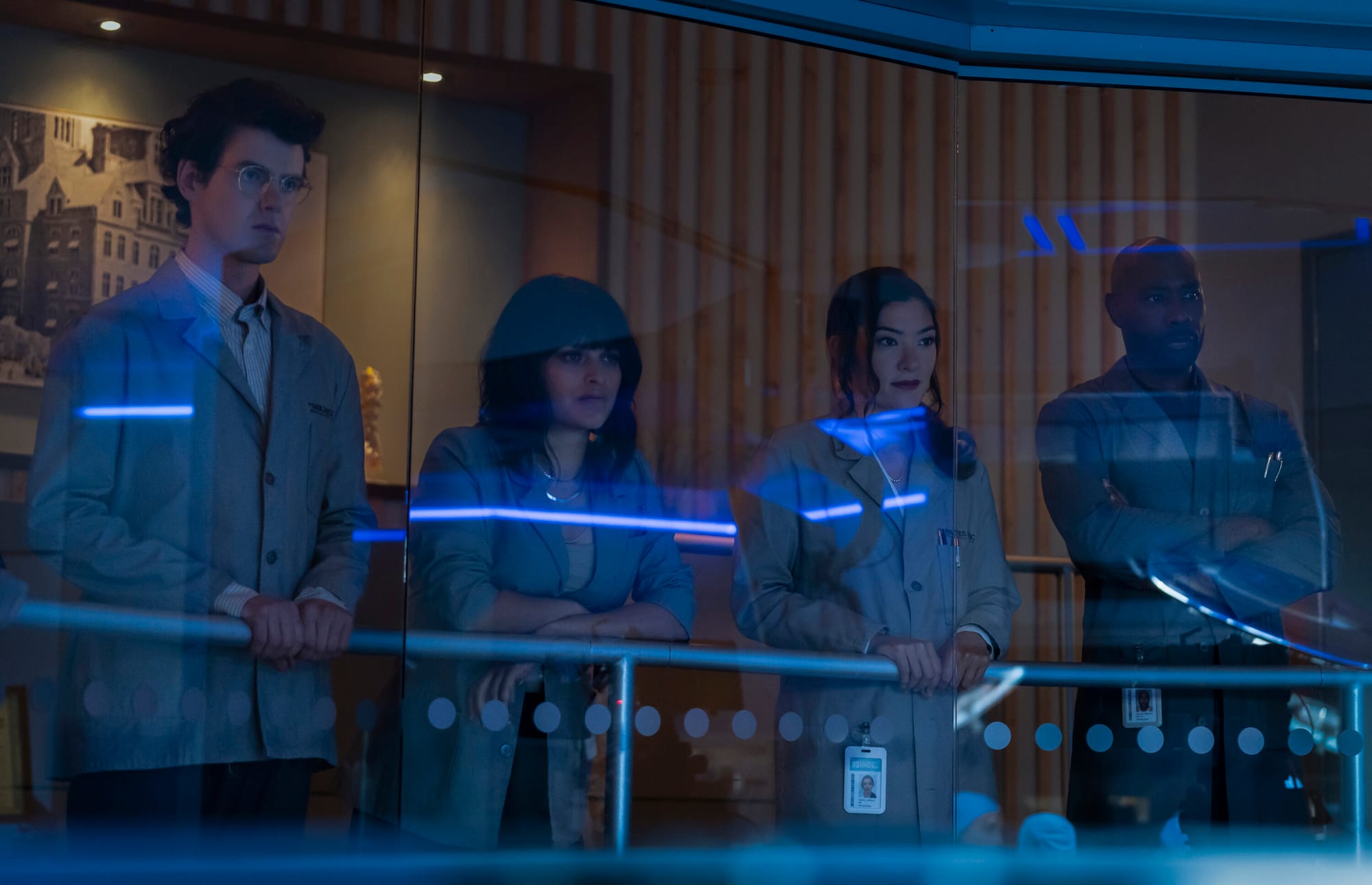 Peter Mark Kendall as Stephens Croft, Inga Schlingmann as Sasha Lubbock, Eve Harlow as Ingrid Derian, and Ritchie Coster as Shinwell Johnson in 'Watson' Season 1