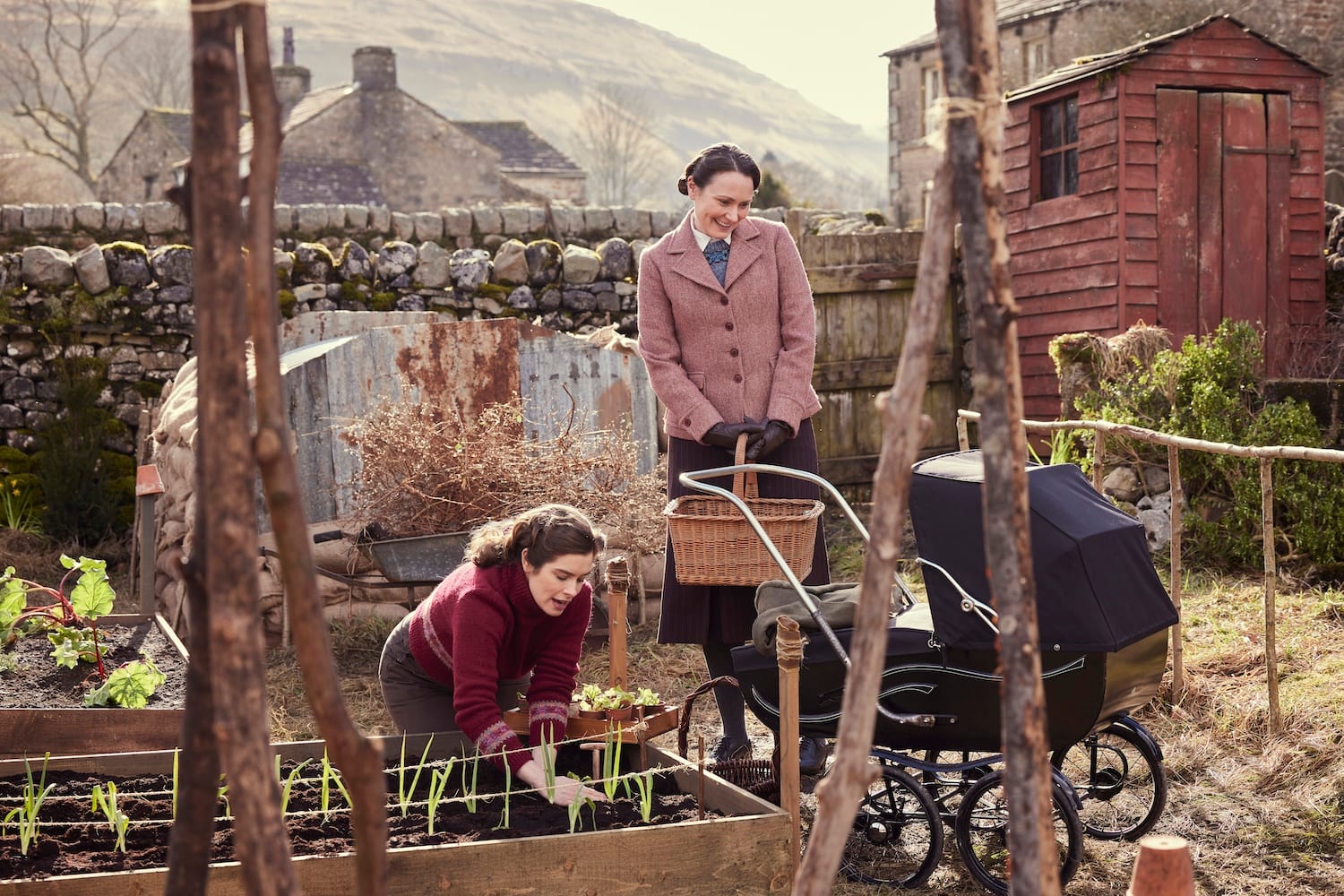 Helen (Rachel Shenton) and Audrey Hall (Anna Madeley) dig for victory.