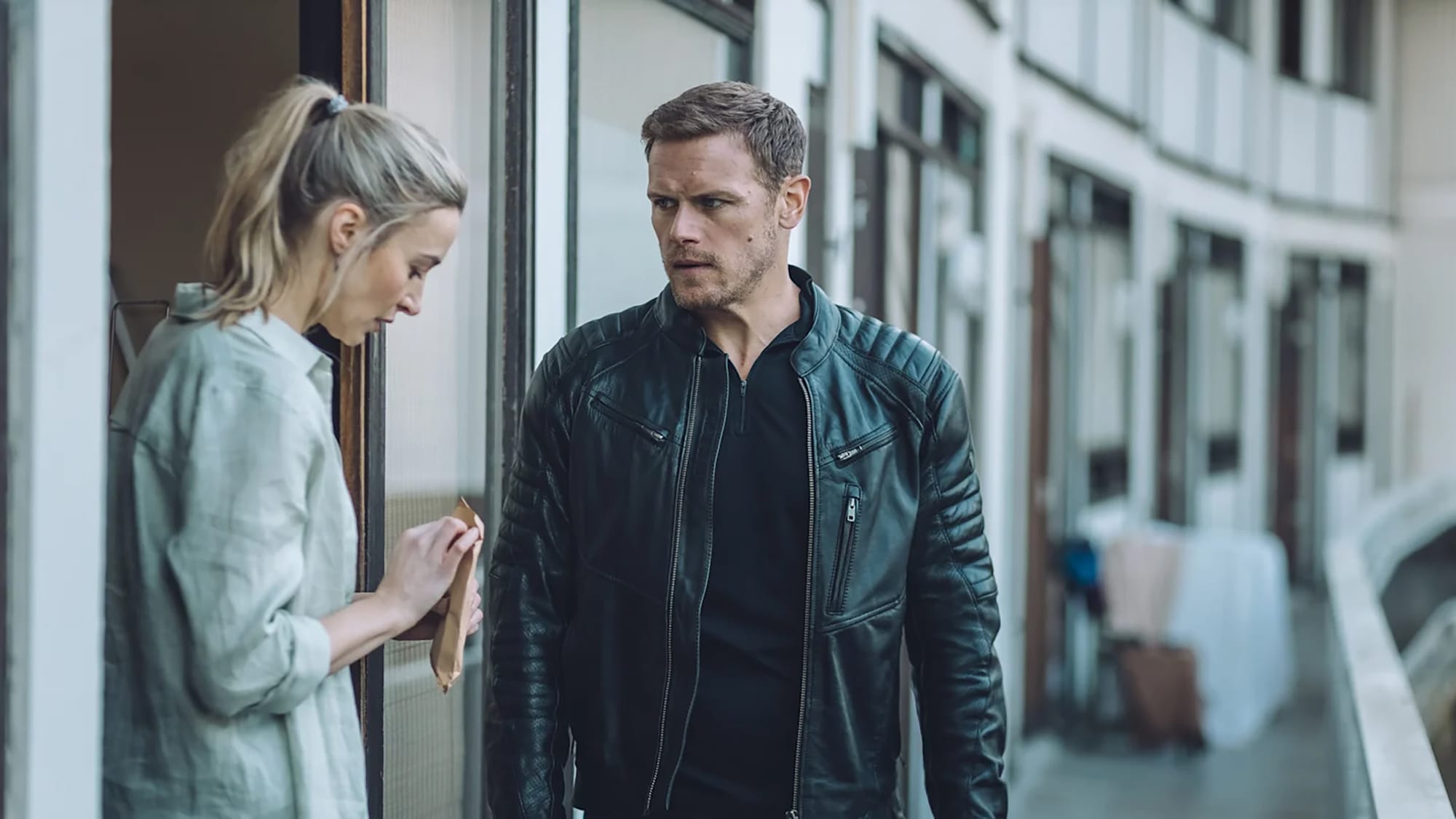 Deirdre Mullins as Lena and Sam Heughan as Danny in 'The Couple Next Door' Season 1