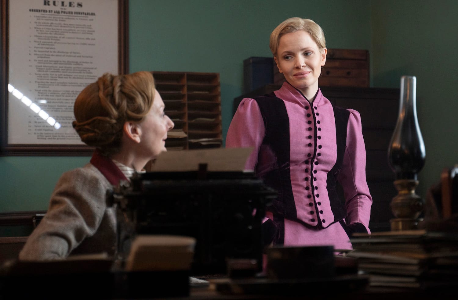 Kate Phillips and Cathy Belton in "Miss Scarlet" Season 5