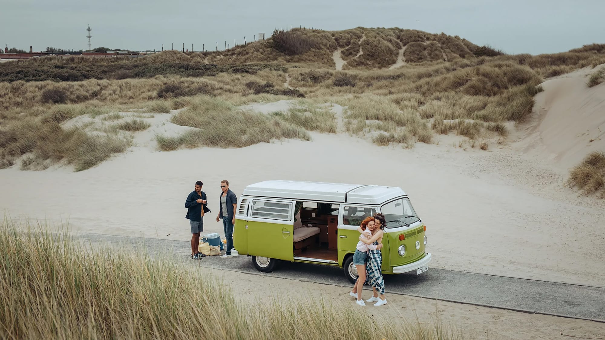 Eleanor Tomlinson as Evie, Alfred Enoch as Pete, Sam Heughan as Danny, and Jessica De Gouw as Becka in 'The Couple Next Door' Season 1