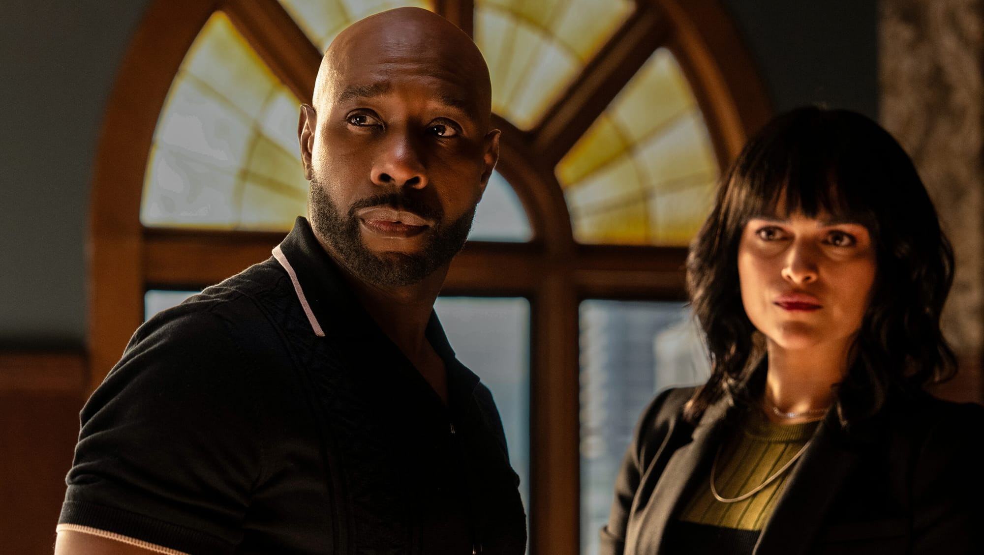Morris Chestnut as Dr. John Watson and Eve Harlow as Dr. Ingrid Derian in 'Watson' Season 1