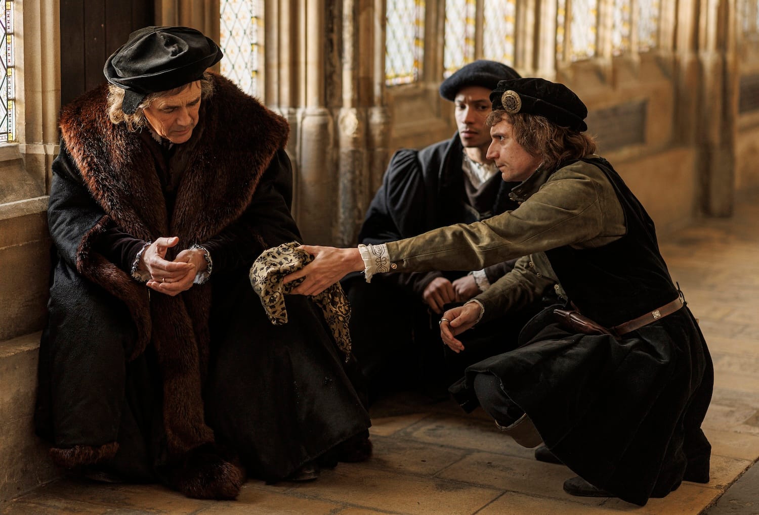 Mark Rylance, Corentin Fila, and Tom Mothersdale in "Wolf Hall: The Mirror and the Light"