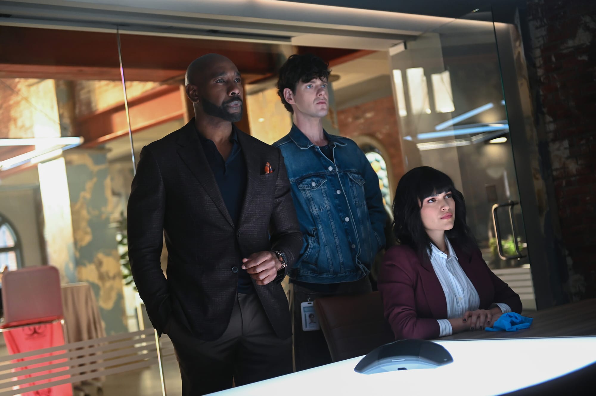 Morris Chestnut as Dr. John Watson, Peter Mark Kendall as Dr. Adam Croft, and Eve Harlow as Dr. Ingrid Derian in 'Watson' Season 1