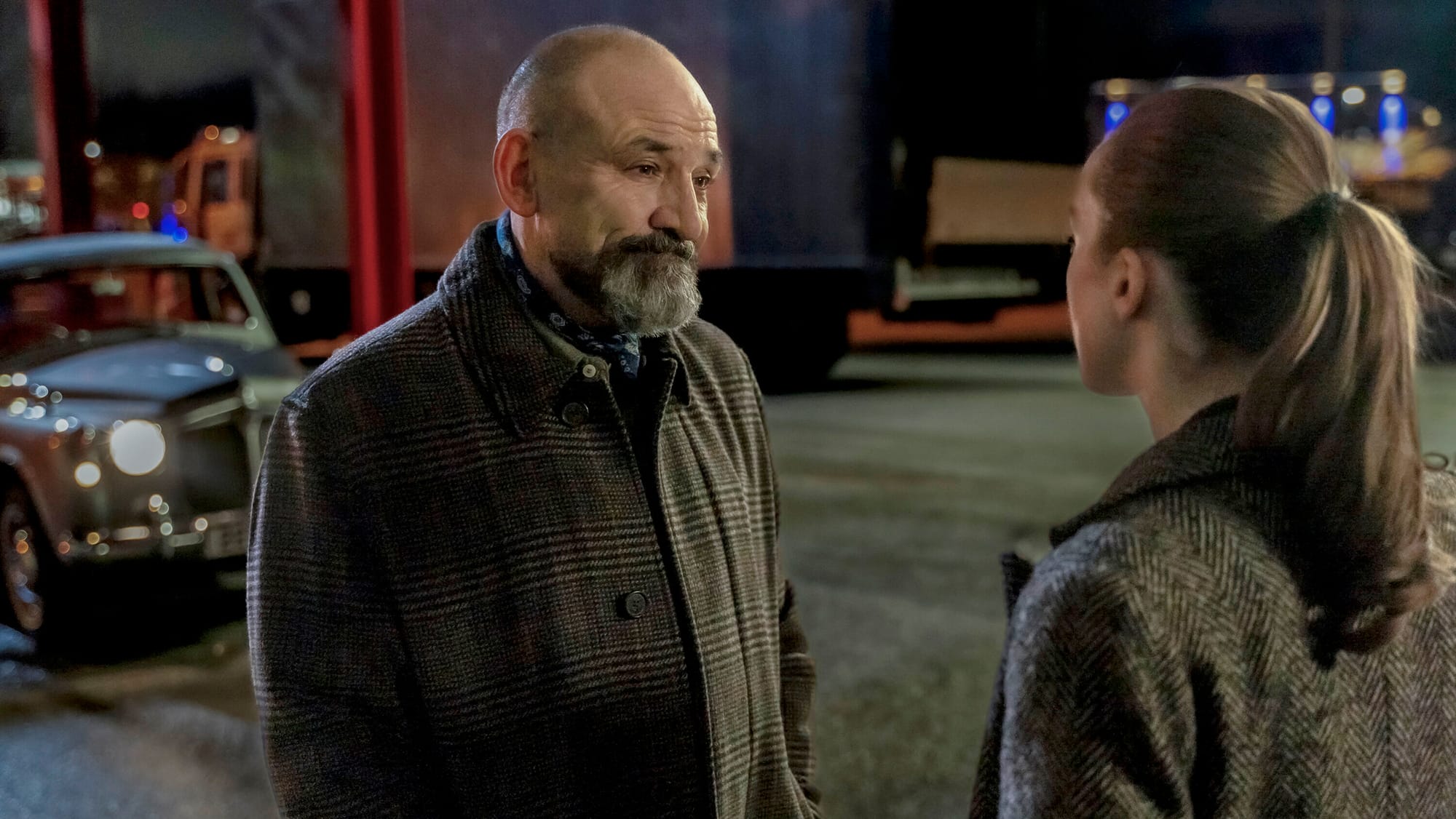 Ritchie Coster as Shinwell Johnson and Kacey Rohl as The Rep in 'Watson' Season 1