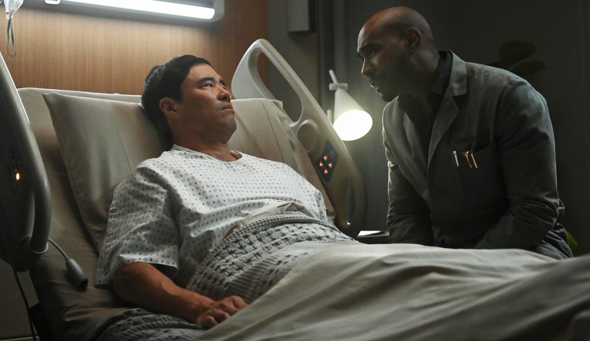 Randall Park as Moriarty and Morris Chestnut as Dr. John Watson in 'Watson' Season 1