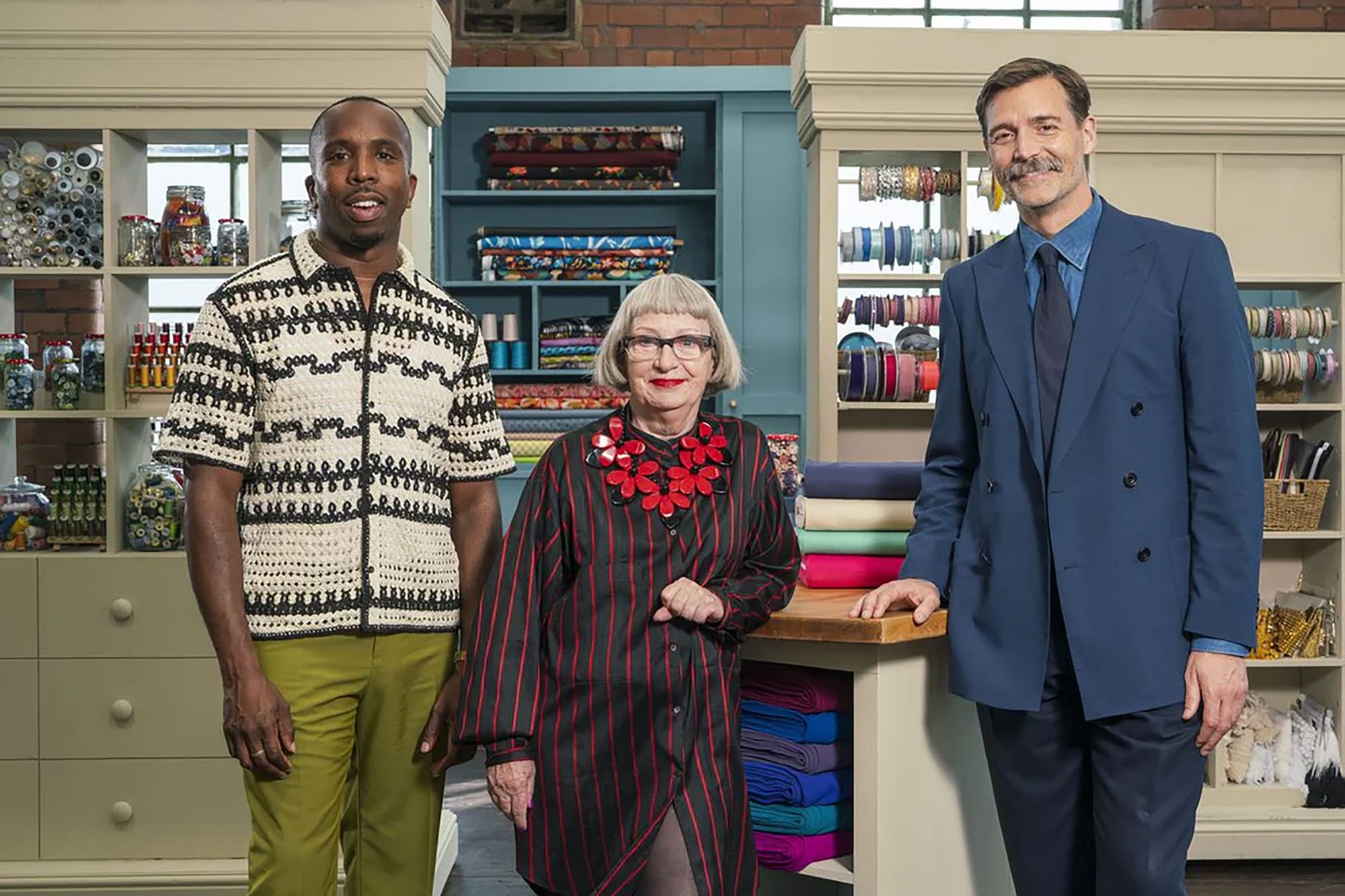 Host Kiell Smith-Bynoe and judges Esme Young and Patrick Grant in 'The Great British Sewing Bee' Season 10