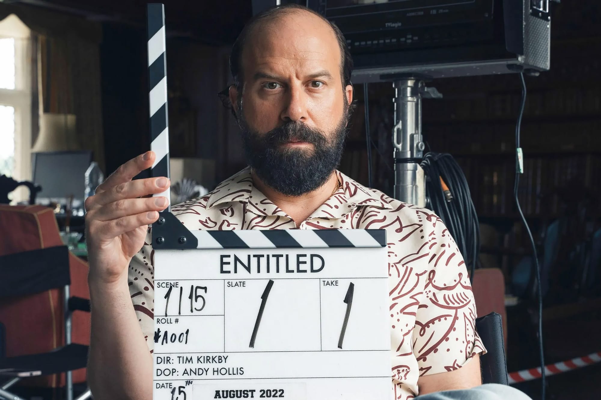 Brett Gelman with the 'Entitled' Clapperboard