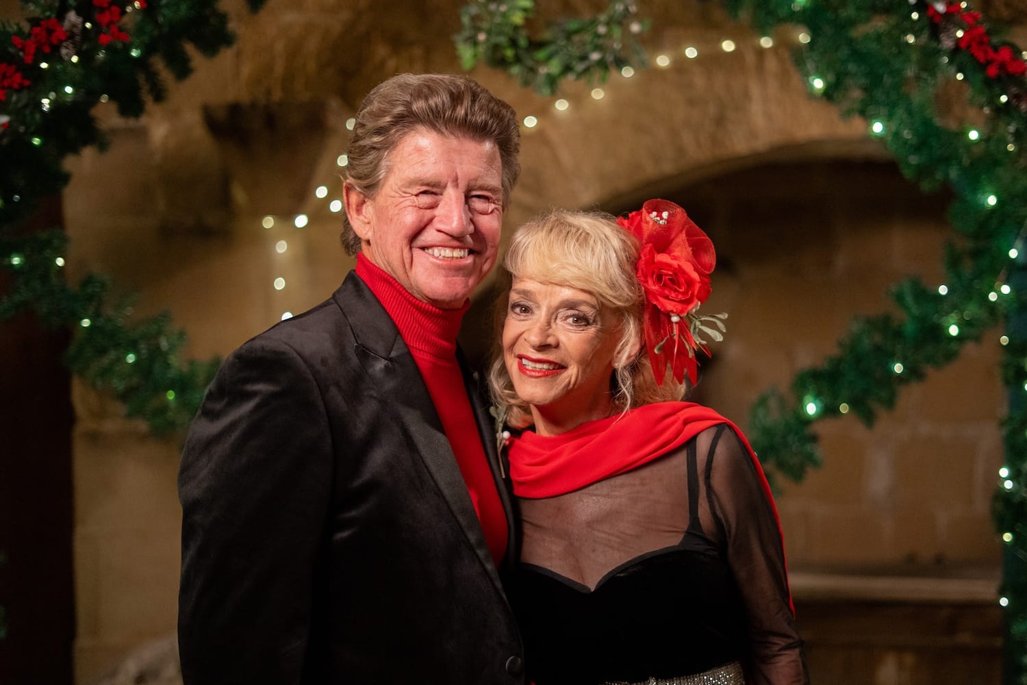 Jeremy (Robin Askwith) and Judith Lloyd-James (Sue Holderness).