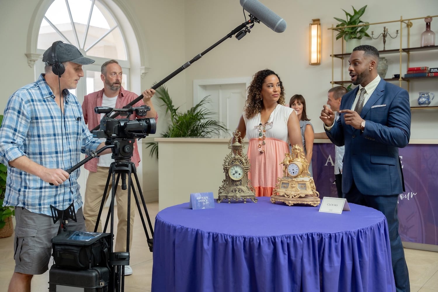 Director David (Les Dennis), volunteer Dom (Steve Edge), presenter Elaine (Lorraine Burroughs), and co-host Nick (Richard Black).