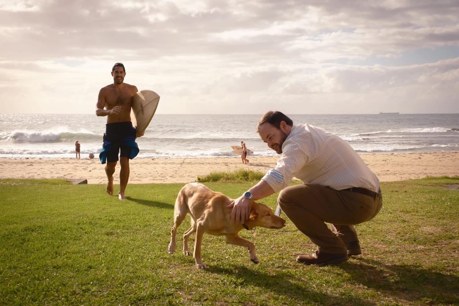 Glenn Strong (Tai Hara), Frankie the dog, and Colin Cartwright (Lloyd Griffith).