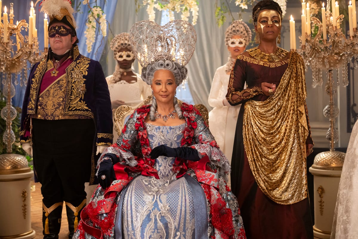 Hugh Sachs as Brimsley, Golda Rosheuvel as Queen Charlotte, Adjoa Andoh as Lady Danbury in 'Bridgerton' Season 4.