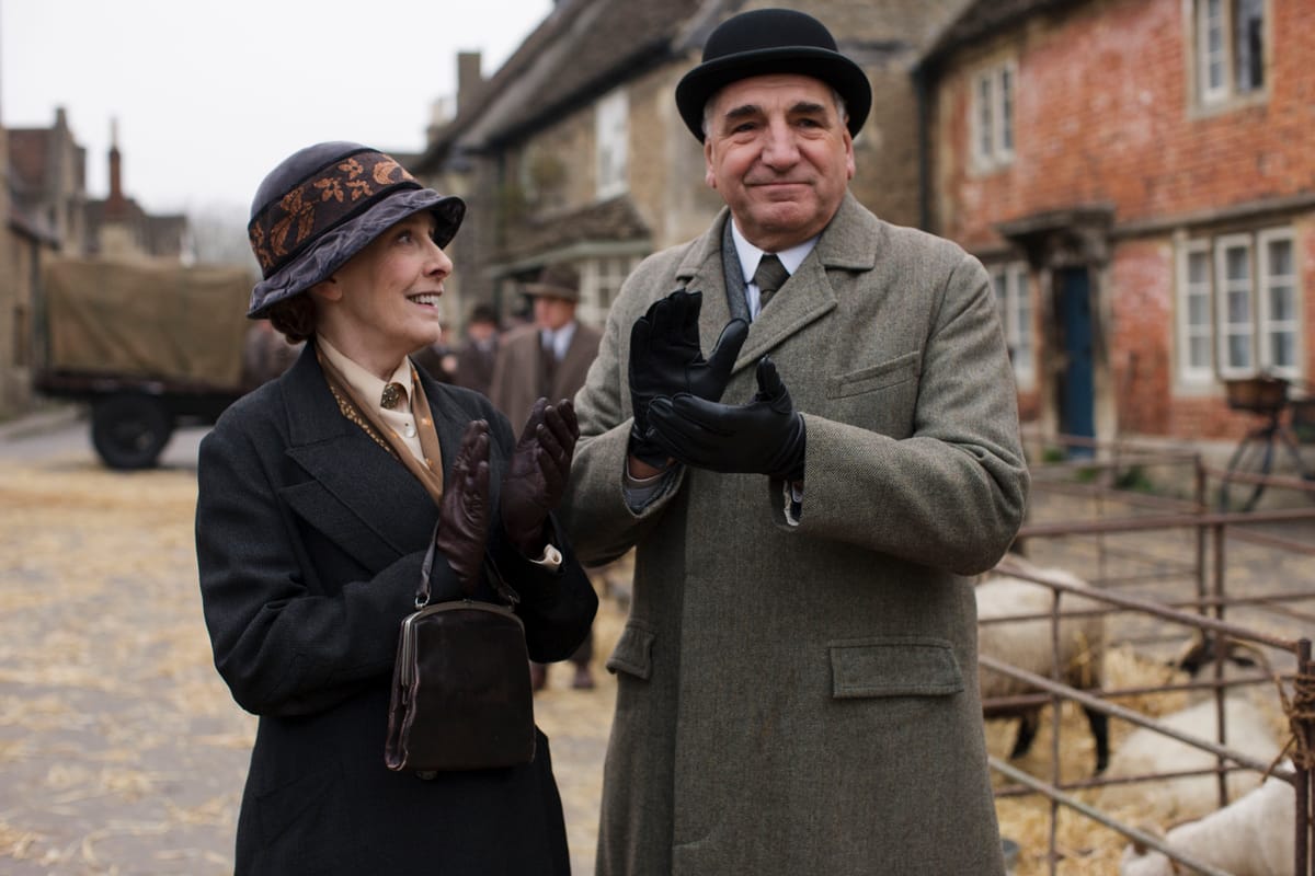 Carson and Mrs. Hughes at the agricultural show looking very happy.